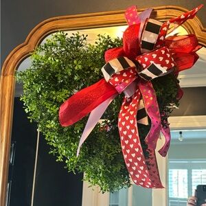 Heart-Shaped Greenery Wreath with Red and Pink Ribbon